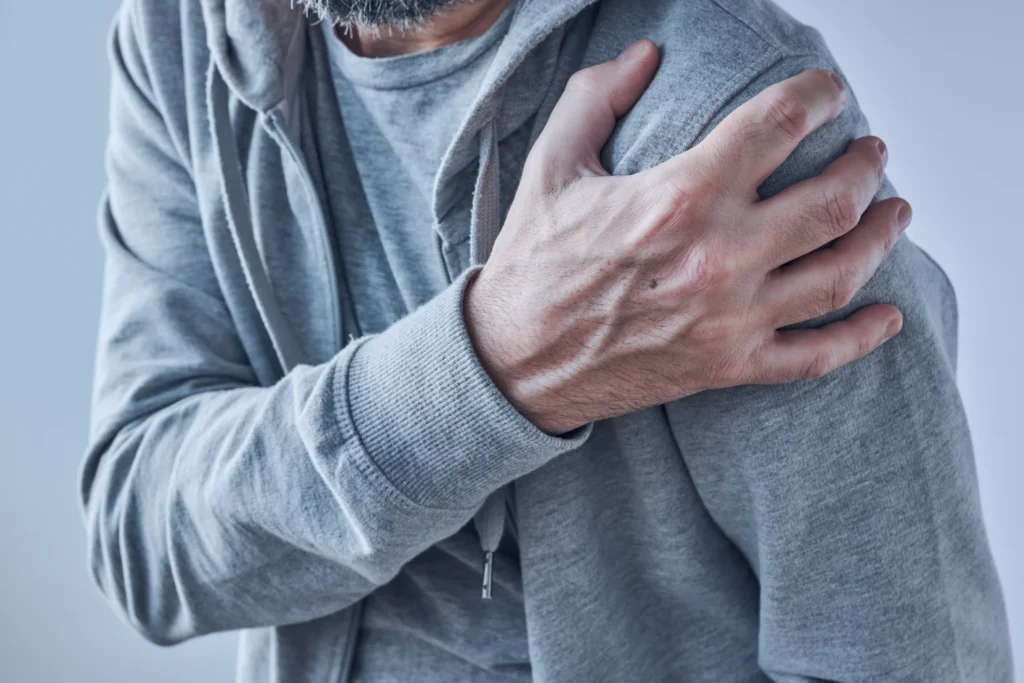 man in gray hoodie with hand on shoulder 2026 03 17 05 03 04 utc
