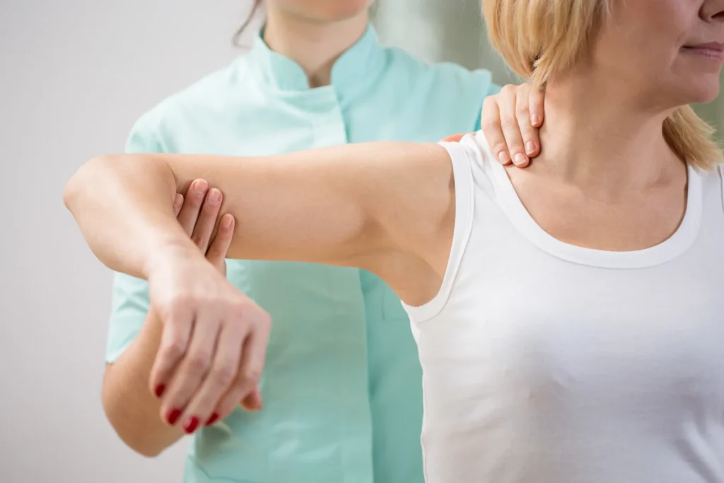 Services 5 woman receiving upper body physiotherapy from phys 2026 04 13 23 29 13 utc